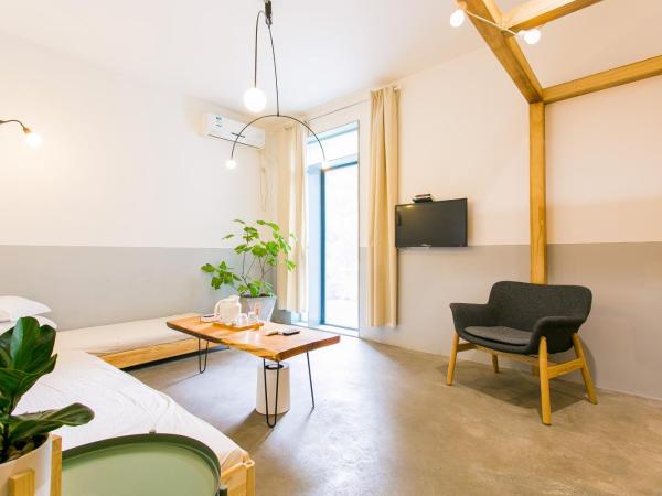 HOME++ Xi'an : photo 3 de la chambre balcony suits with city view- shiny moon