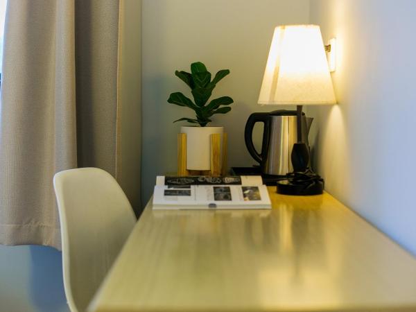 HOME++ Xi'an : photo 2 de la chambre chambre lits jumeaux standard