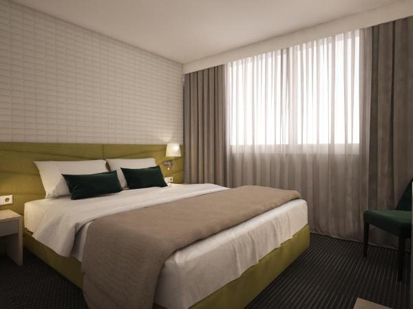 Masa Hotel 5 de Outubro : photo 3 de la chambre chambre lits jumeaux