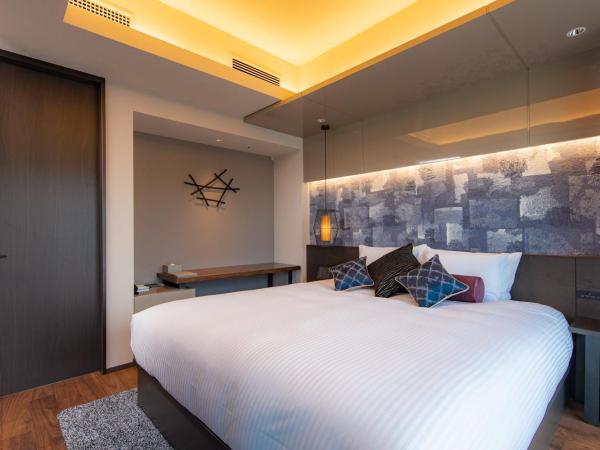 THE BLOSSOM HIBIYA : photo 4 de la chambre suite avec lit king-size