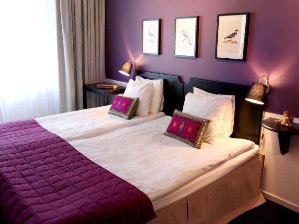 Lilla Rådmannen : photo 1 de la chambre chambre familiale