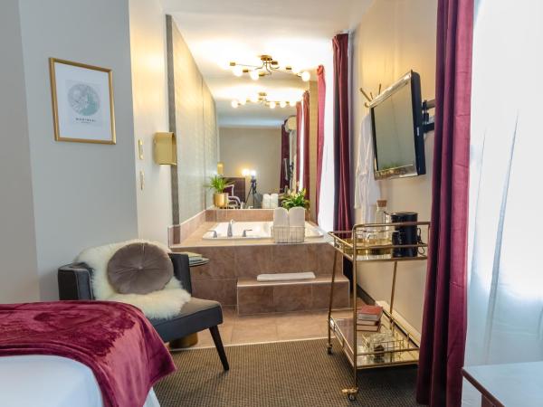 Maison Cartier Montreal : photo 4 de la chambre chambre lit queen-size avec baignoire spa