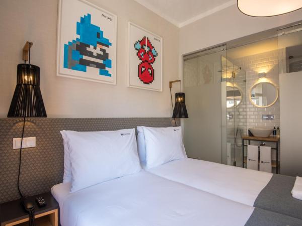 Urbano FLH Hotels Lisboa : photo 4 de la chambre chambre lits jumeaux