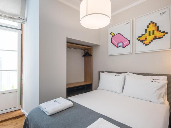 Urbano FLH Hotels Lisboa : photo 1 de la chambre chambre simple avec vue sur l'intérieur