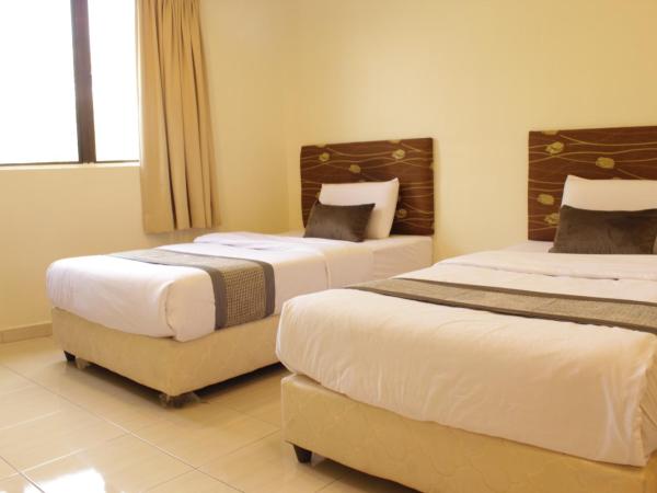 Hotel Bandar Baru Menglembu : photo 1 de la chambre chambre lits jumeaux deluxe