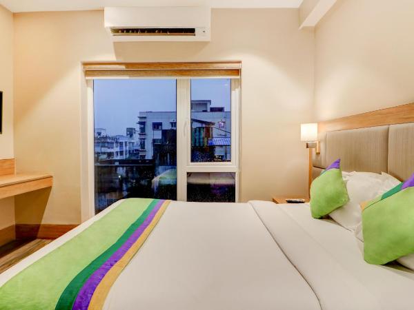 Treebo Radhe Palace : photo 4 de la chambre [sanitized] standard double room