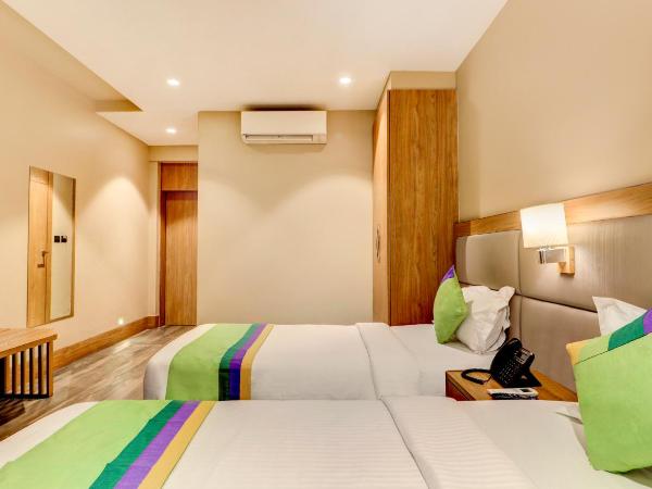 Treebo Radhe Palace : photo 10 de la chambre [sanitized] deluxe double or twin room