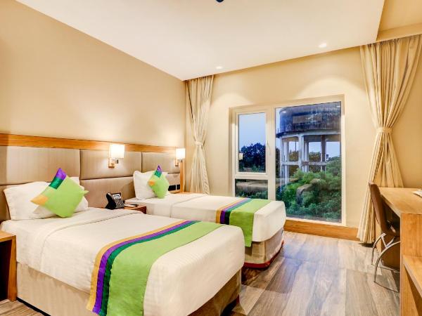 Treebo Radhe Palace : photo 7 de la chambre [sanitized] deluxe double or twin room