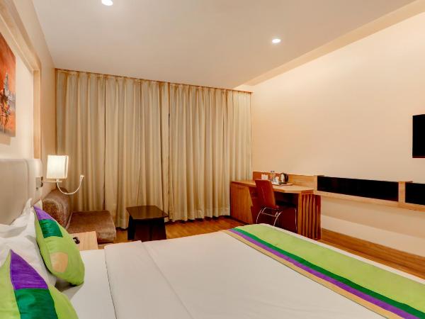 Treebo Radhe Palace : photo 7 de la chambre chambre double supérieure [assainie]