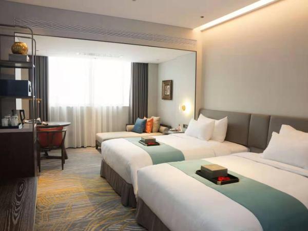Dong Fang Hotel Guangzhou- Free Shuttle Bus to Canton Fair Complex & Overseas Buyer Registration Services during Canton Fair Period : photo 1 de la chambre chambre lits jumeaux Élite - non-fumeurs
