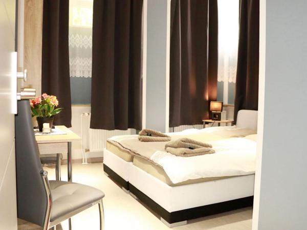 Amaya Motel : photo 5 de la chambre chambre lits jumeaux standard avec salle de bains commune
