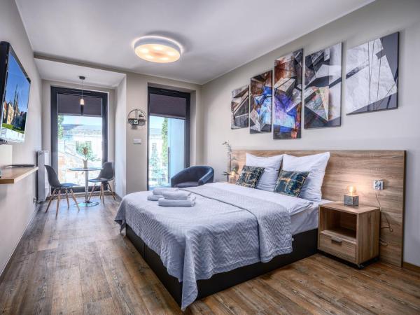 RAJSKA 3 by PI Apartments : photo 1 de la chambre hébergement boiseries