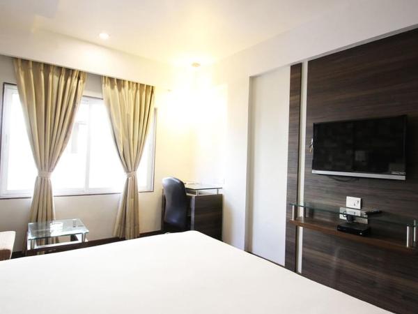 Hotel Aaram Orchard : photo 2 de la chambre chambre double ou lits jumeaux exécutive