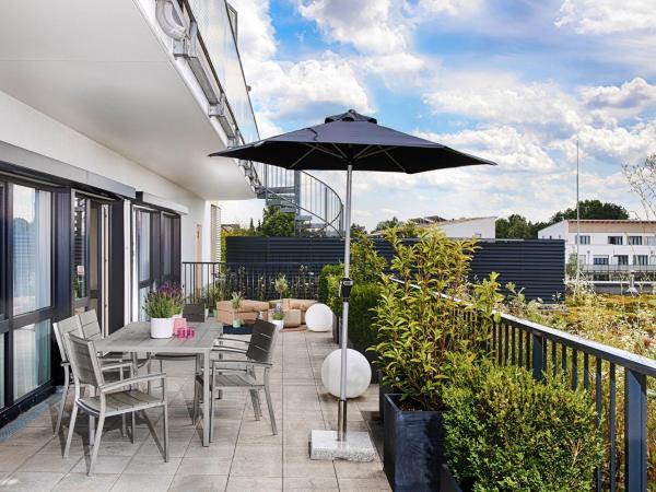 MLOFT Apartments München : photo 2 de la chambre two-bedroom apartment with kitchenette and terrace (6 adults)