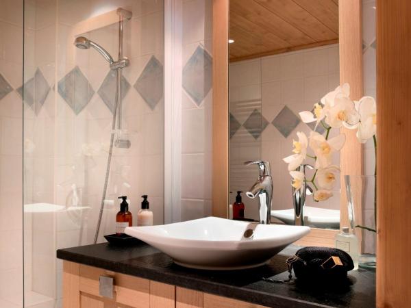 CGH Résidence Boutique Le Lodge des Neiges : photo 6 de la chambre appartement 2 chambres