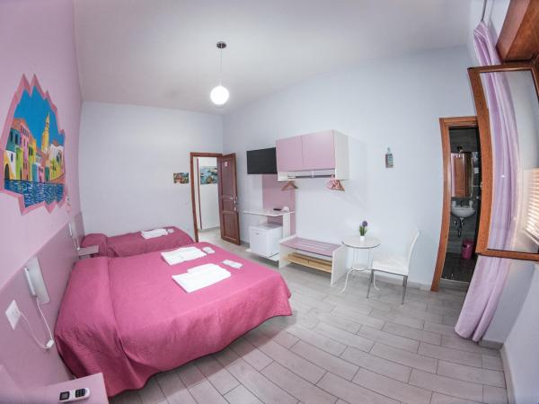 B&B Le isole : photo 6 de la chambre chambre quadruple classique