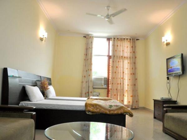 Hotel Home Stay Dwarka : photo 6 de la chambre chambre triple deluxe
