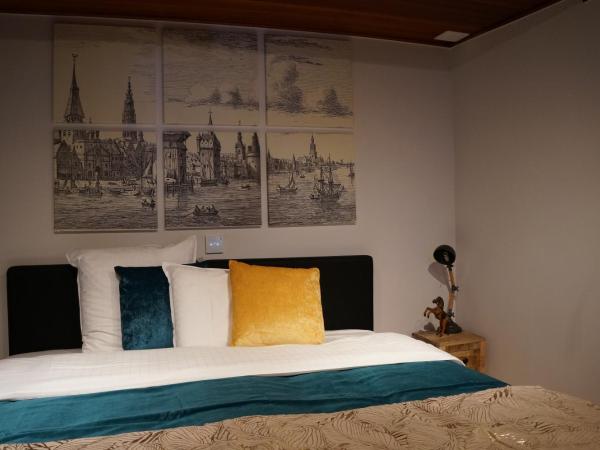 Charming Suites Jan Zonder Vrees : photo 6 de la chambre suite deluxe avec 1 lit double ou 2 lits simples