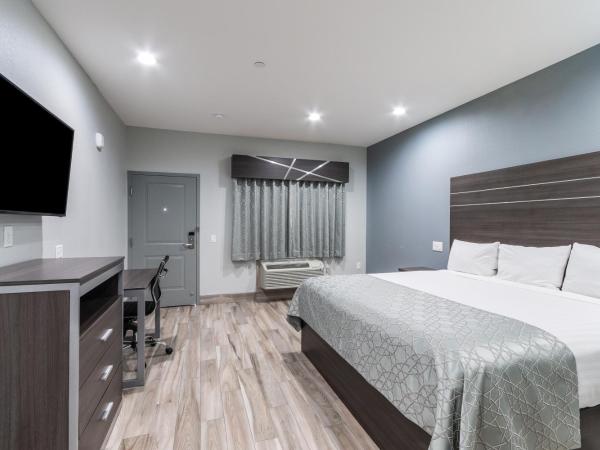 Americas Best Value Inn & Suites Northeast Houston I-610 : photo 2 de la chambre lit king-size