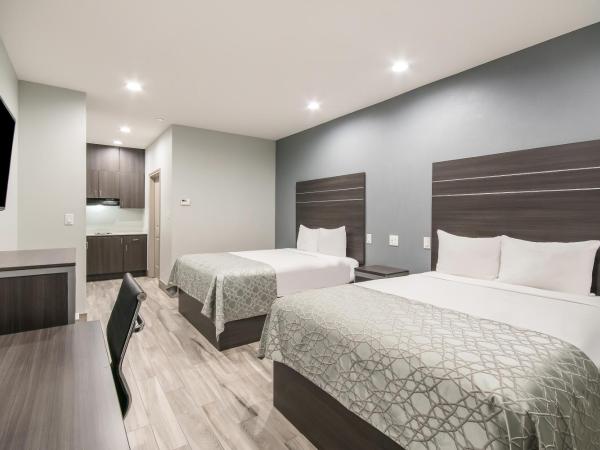 Americas Best Value Inn & Suites Northeast Houston I-610 : photo 3 de la chambre 2 queen beds suite kitchen