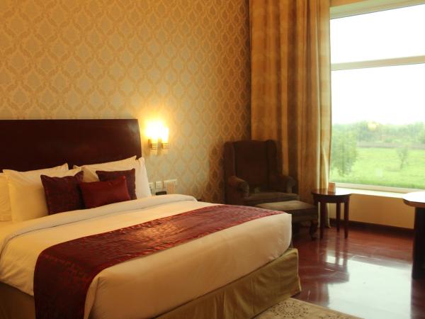 Ramada by Wyndham Jaipur Jaisinghpura : photo 6 de la chambre premium king room (non smoking)