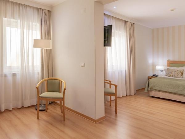 Luna Esperanca Centro Hotel : photo 3 de la chambre chambre double ou lits jumeaux