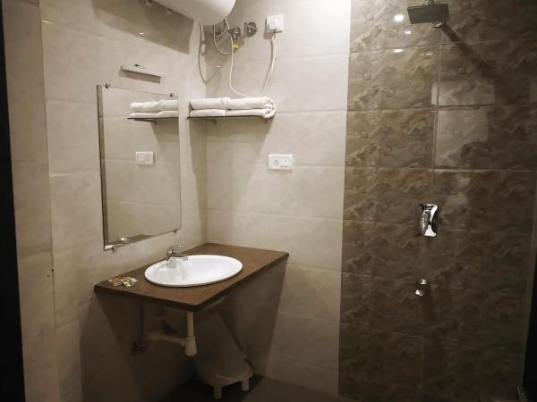 Hotel Suryansh : photo 5 de la chambre chambre deluxe