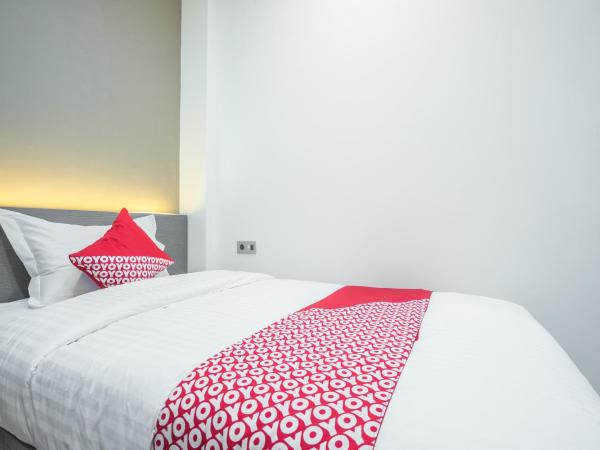 Super OYO 1487 Residence Khoe : photo 1 de la chambre chambre simple deluxe