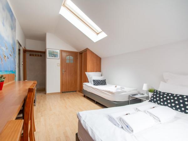 Plac Rybaków Inn : photo 3 de la chambre chambre triple