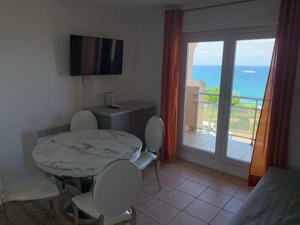 Mer et Golf : photo 1 de la chambre appartement 1 chambre (2 adultes + 2 enfants) - vue sur mer