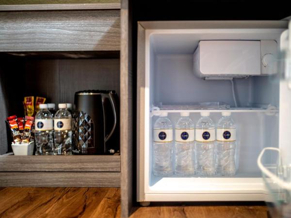 CUBE Family Boutique Capsule Hotel at Chinatown : photo 1 de la chambre chambre quadruple de luxe avec 2 lits queen-size