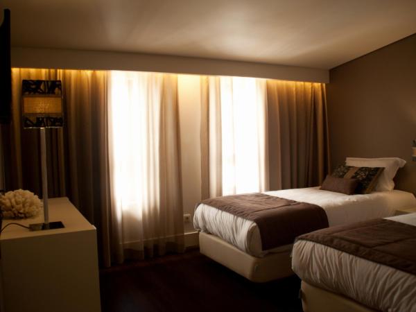 Aqua Ria Boutique Hotel : photo 5 de la chambre chambre familiale (4 adultes)