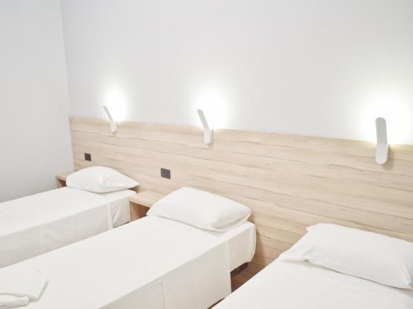 Miu Hotel : photo 2 de la chambre chambre triple