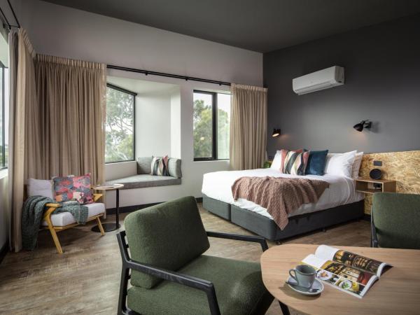 Marion Hotel : photo 1 de la chambre chambre lit king-size de luxe avec baignoire