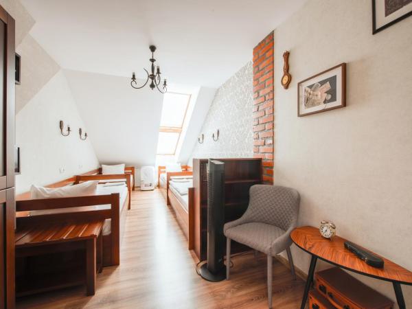 Ginger ApartHostel : photo 1 de la chambre chambre quadruple avec salle de bains commune