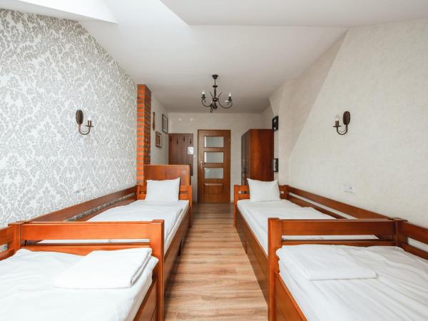 Ginger ApartHostel : photo 2 de la chambre chambre quadruple avec salle de bains commune