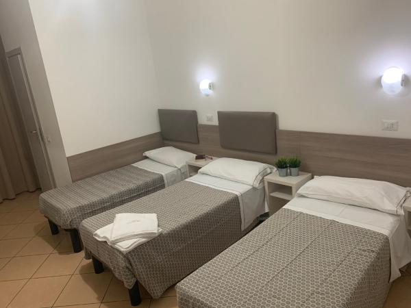 Hotel Siro : photo 4 de la chambre chambre triple