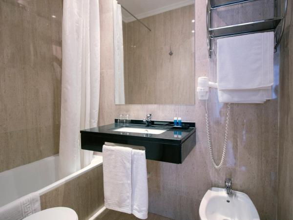 Hotel Maestranza : photo 9 de la chambre chambre double ou lits jumeaux