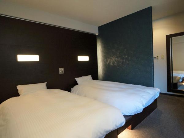 Green Rich Hotel Hiroshima Shinkansenguchi (Artificial hot spring Futamata Yunohana) : photo 3 de la chambre chambre lits jumeaux - fumeurs