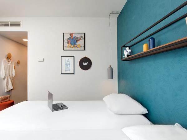 Hôtel ibis Styles Clermont-Ferrand Gare : photo 7 de la chambre chambre double avec canapé-lit