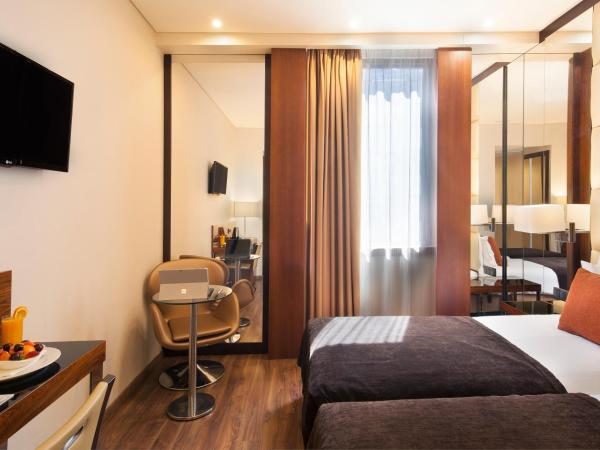 TURIM Av. Liberdade Hotel : photo 3 de la chambre chambre lits jumeaux supérieure