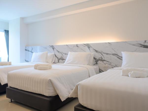 Donmueang Place Hotel - SHA Plus : photo 1 de la chambre chambre triple deluxe