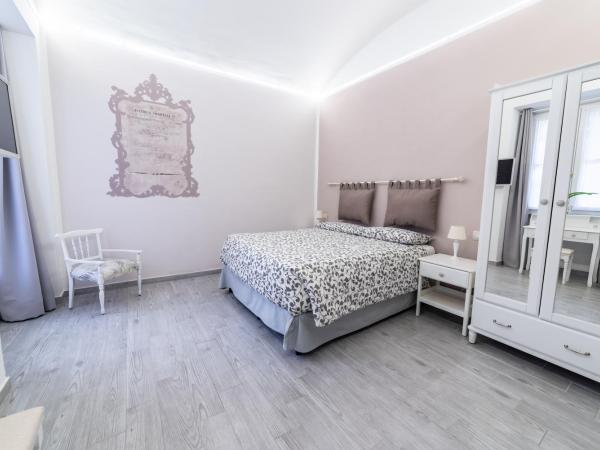 Re Vittorio : photo 10 de la chambre chambre double ou lits jumeaux avec salle de bains privative