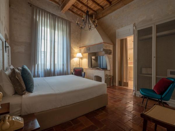 Residenza La Musa Amarcord : photo 1 de la chambre chambre deluxe