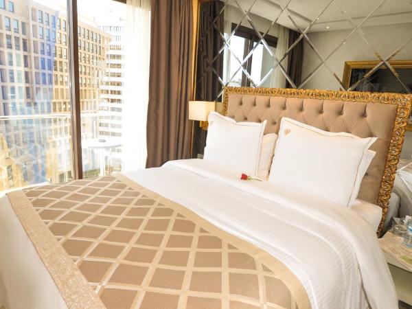 Suite Hotel Casa Diamond : photo 4 de la chambre suite junior standard lit king-size