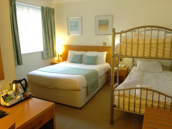 Carousel Hotel : photo 5 de la chambre chambre familiale (2 adultes et 2 enfants)