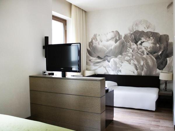 Starhotels Echo : photo 6 de la chambre chambre triple