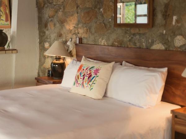 Villas Carrizalillo : photo 2 de la chambre suite lit king-size - vue sur mer