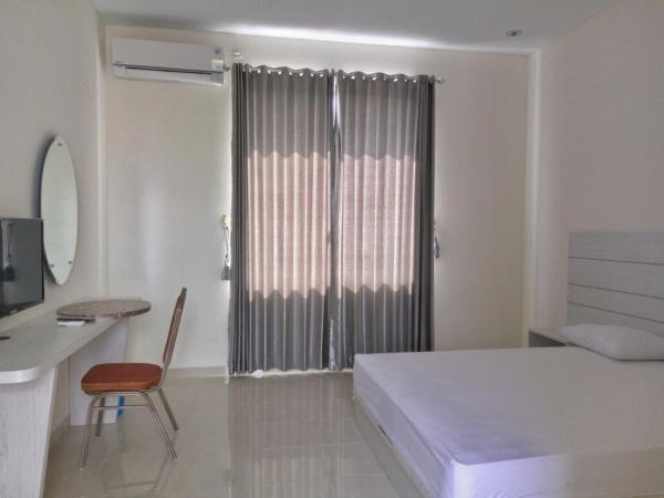 Surokarsan Residence : photo 9 de la chambre chambre double ou lits jumeaux