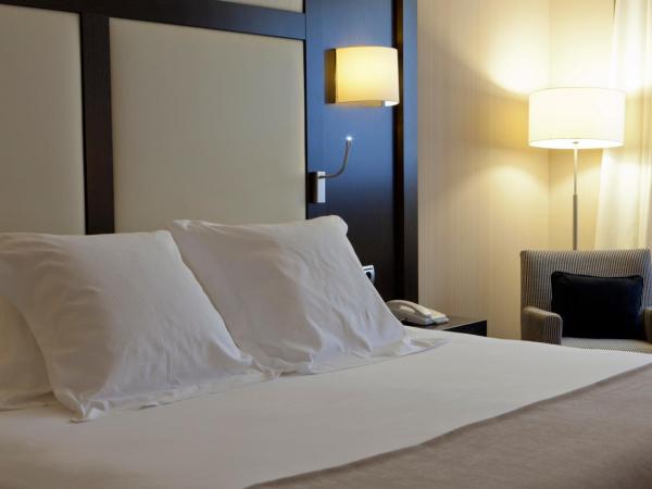 Hotel Maydrit Airport : photo 1 de la chambre chambre quadruple